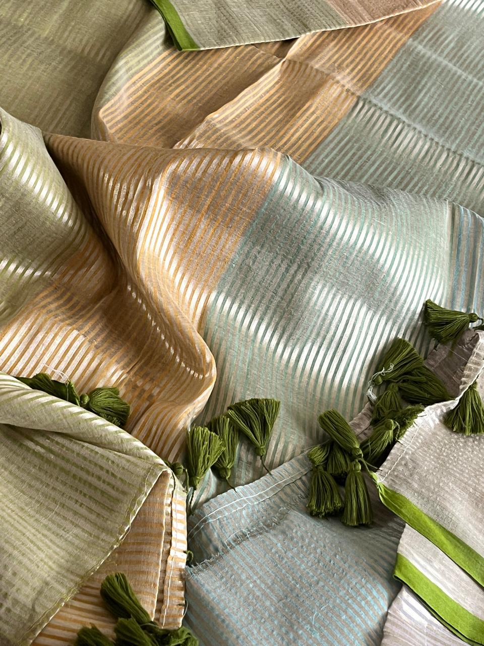 Soft and comfortable Pure Mul Mul Sarees with Zari Stripes - Beige with Green