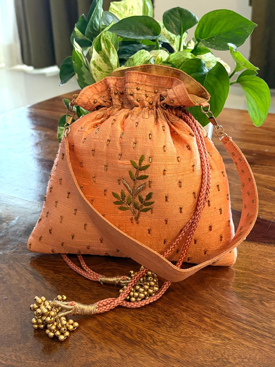 Neelpushpa Peach Floral Zardozi and Kamdani Potli