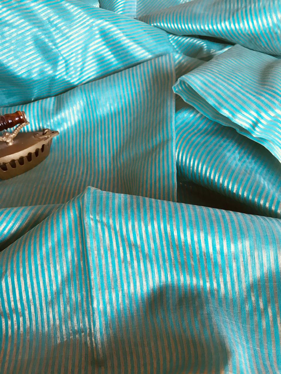 Pure Chanderi Silk Handwoven saree with Silver and Gold zari stripes