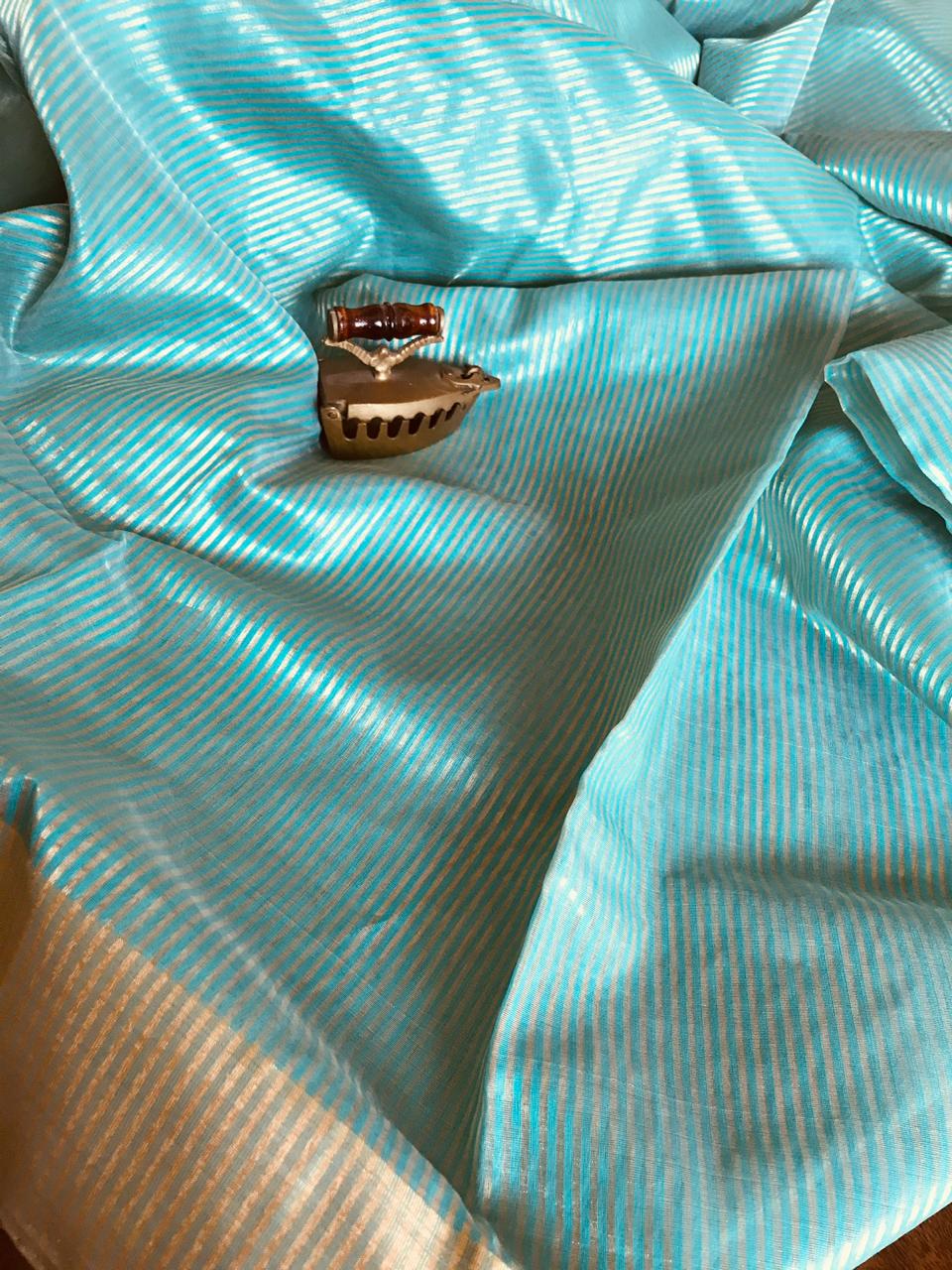 Pure Chanderi Silk Handwoven saree with Silver and Gold zari stripes