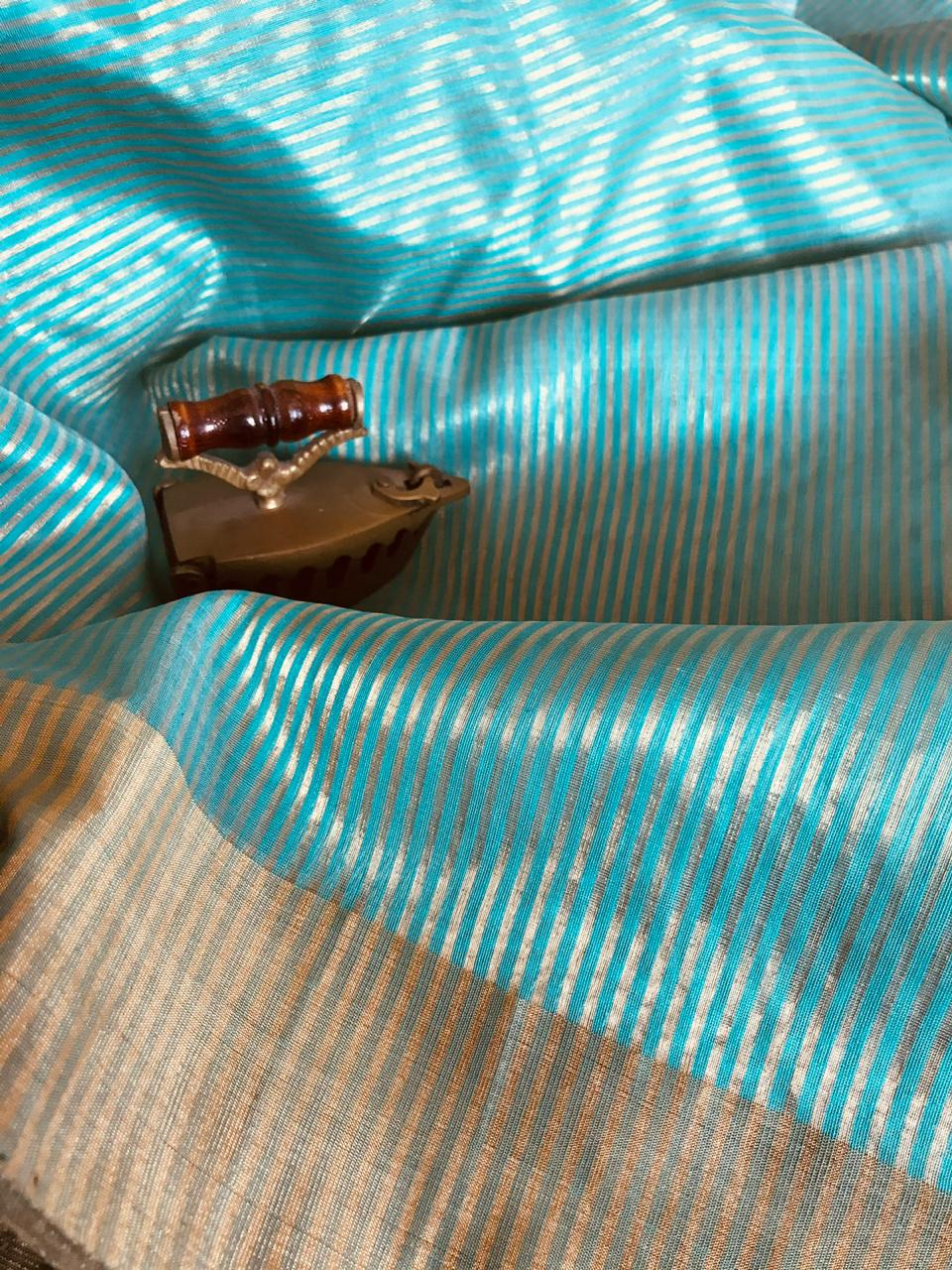 Pure Chanderi Silk Handwoven saree with Silver and Gold zari stripes