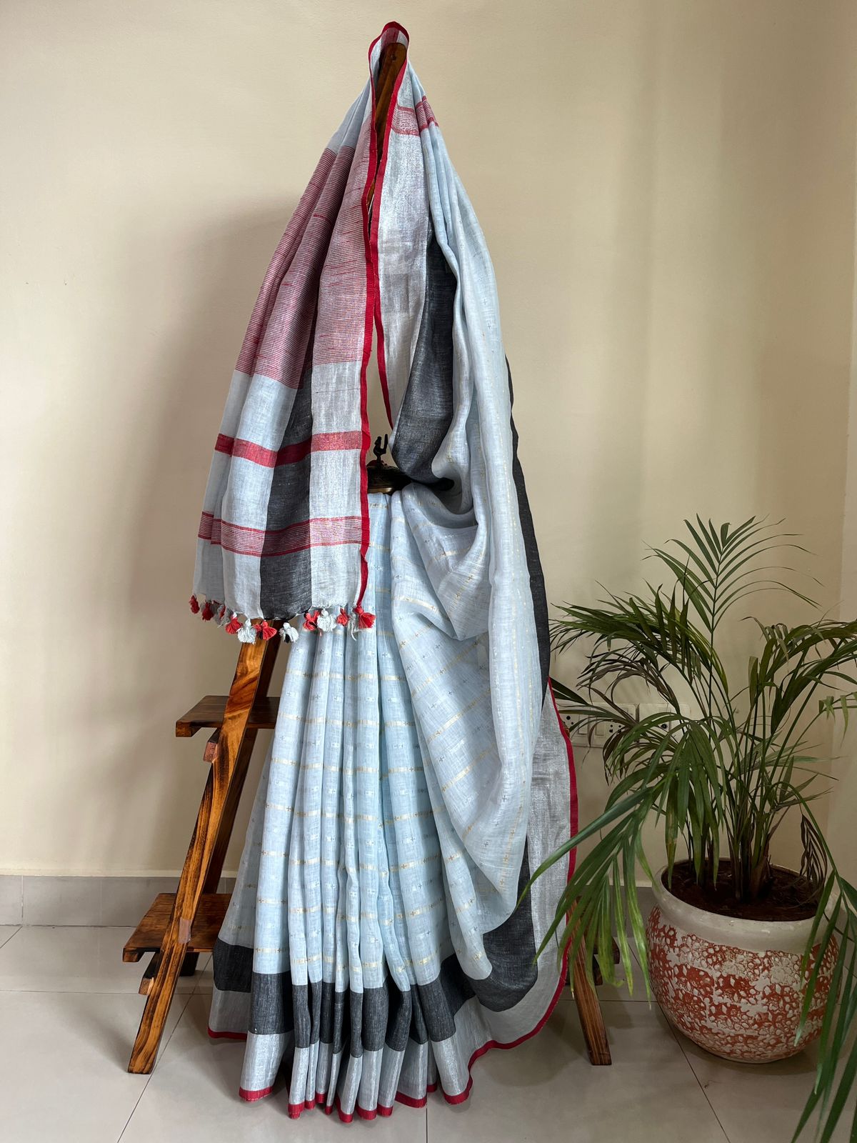 Beautiful handloom festive linen saree with intricate zari weaving- Icey Grey with Silver and Gold