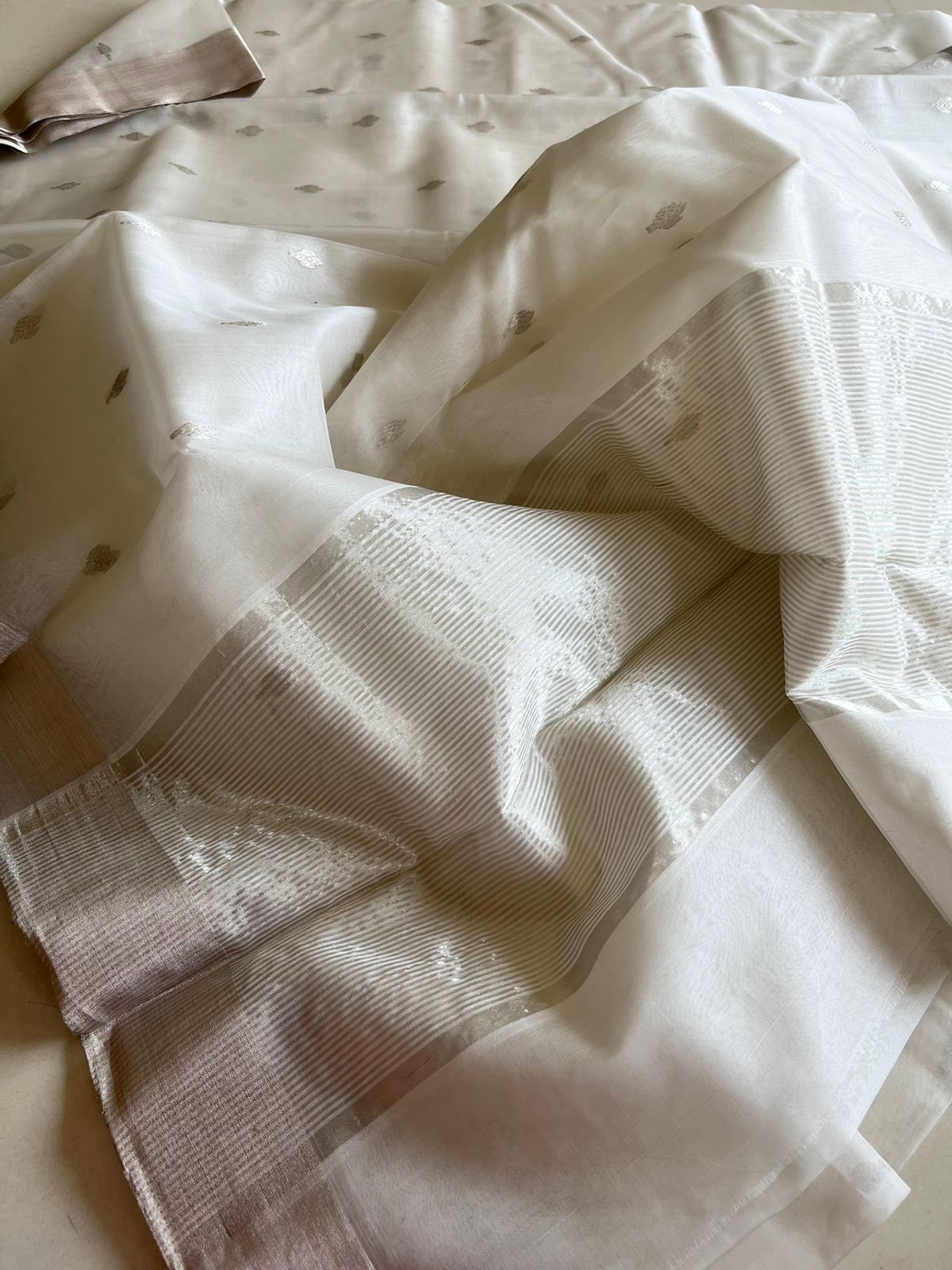 Pure Chanderi Silk Handwoven saree with buttis - White with Silver