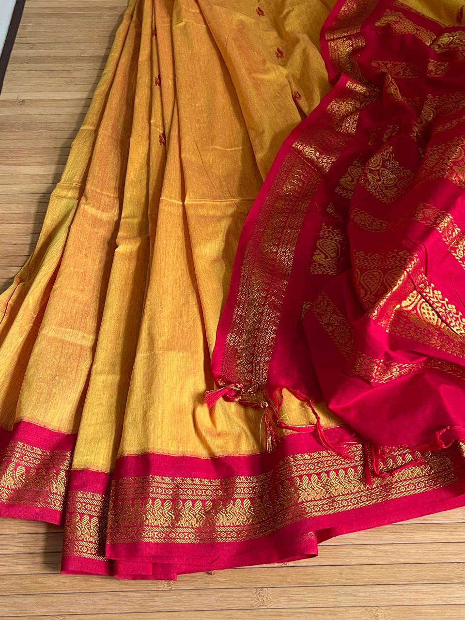 Vibrant handwoven Gadwal cotton Silk Saree - Sunset Orange with Red
