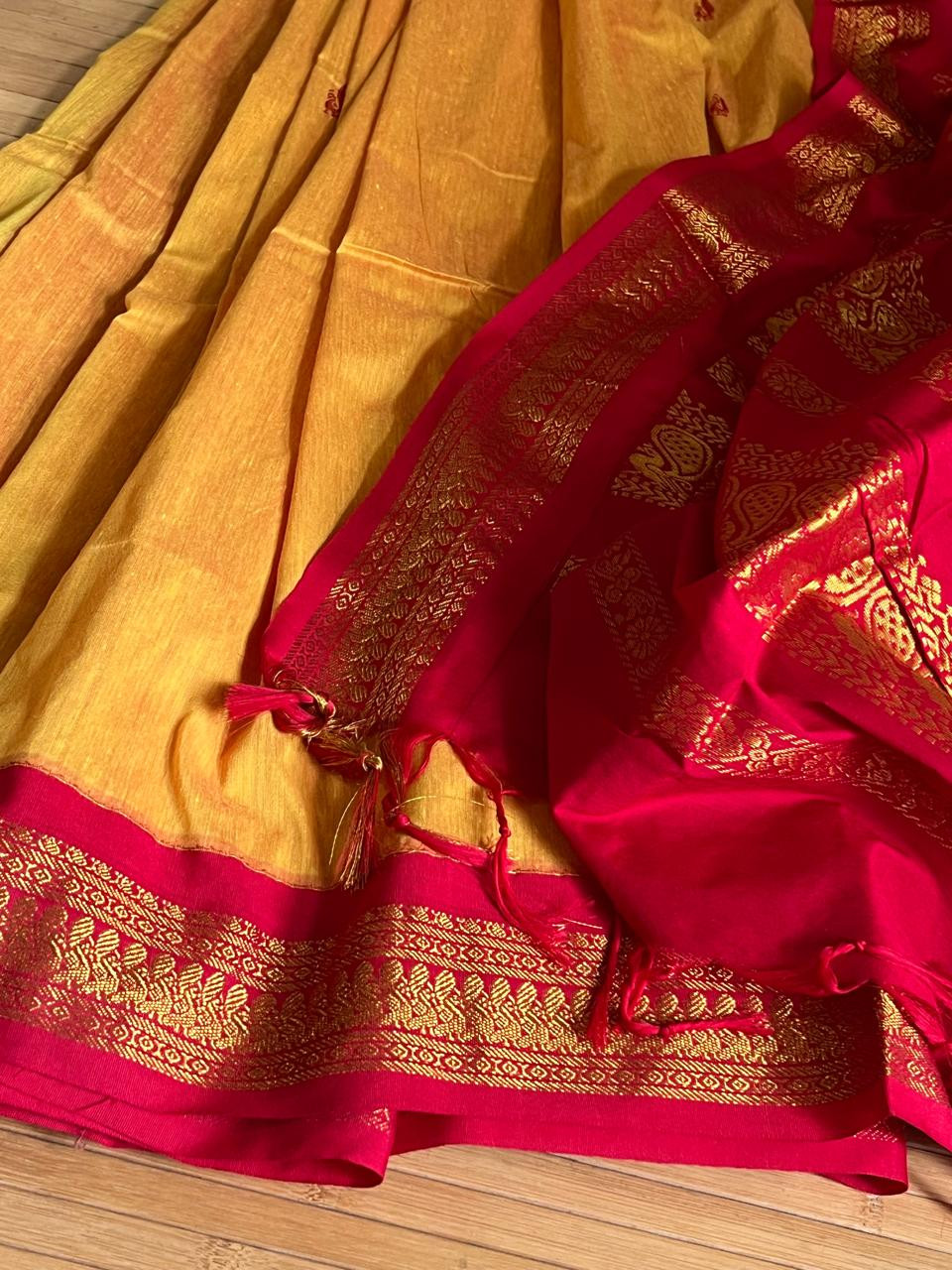Vibrant handwoven Gadwal cotton Silk Saree - Sunset Orange with Red