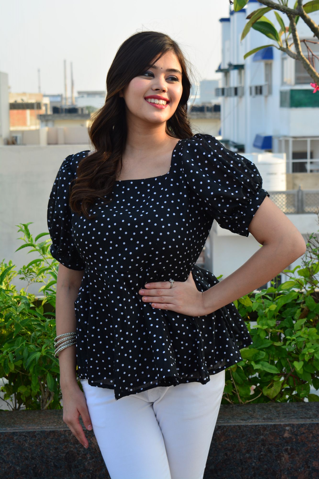 Black polka dot top