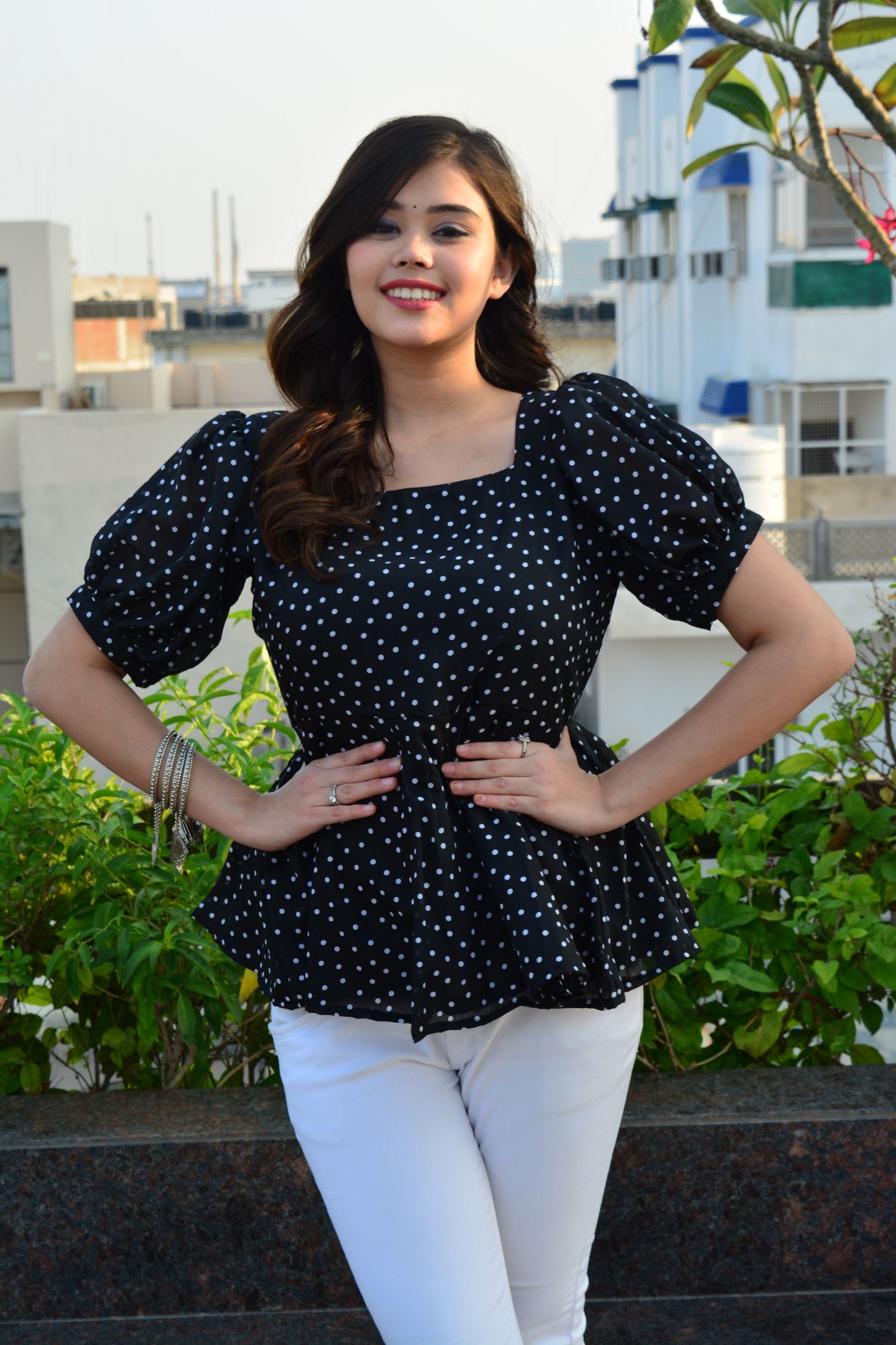 Black polka dot top