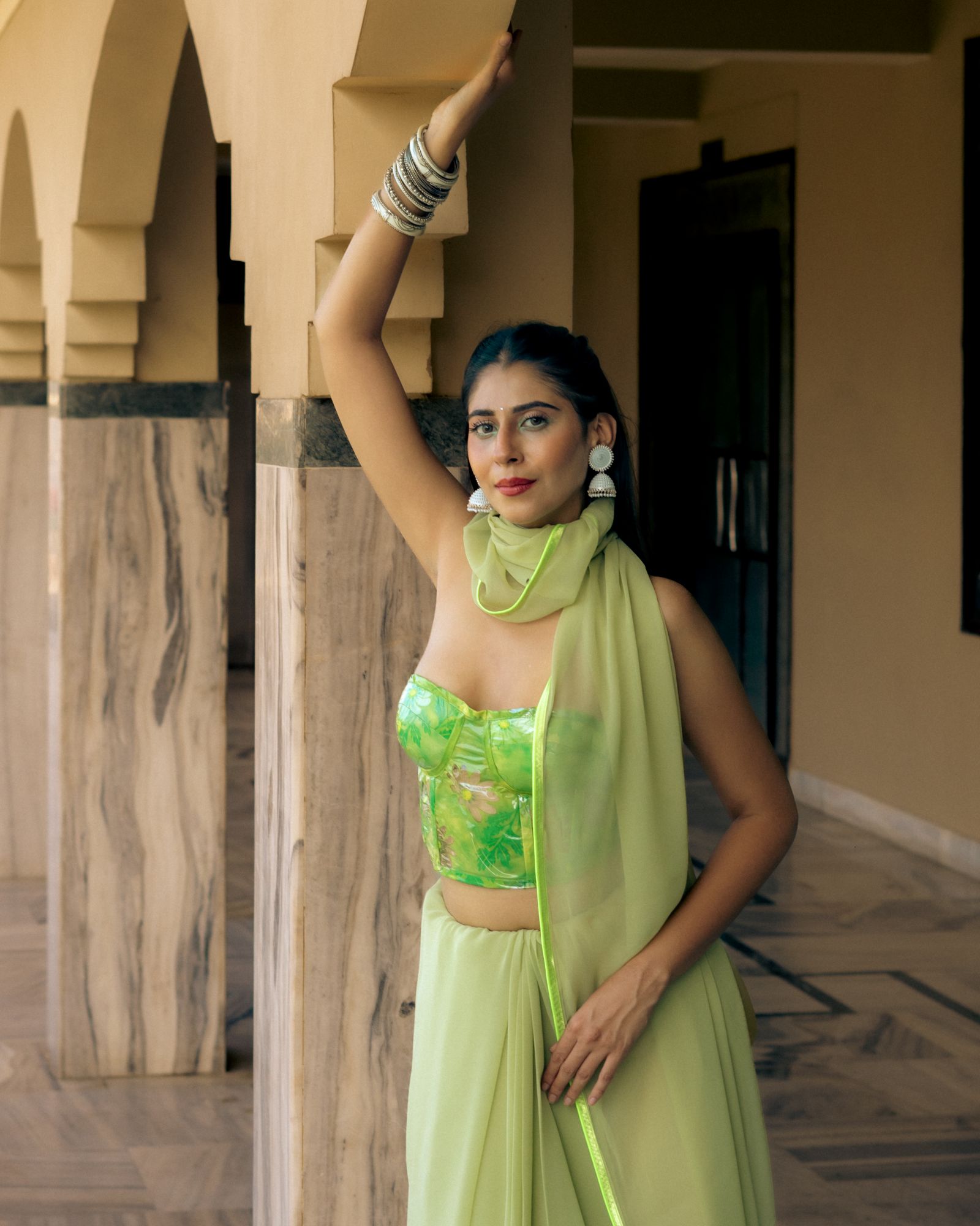 Pastel green saree with corset blouse