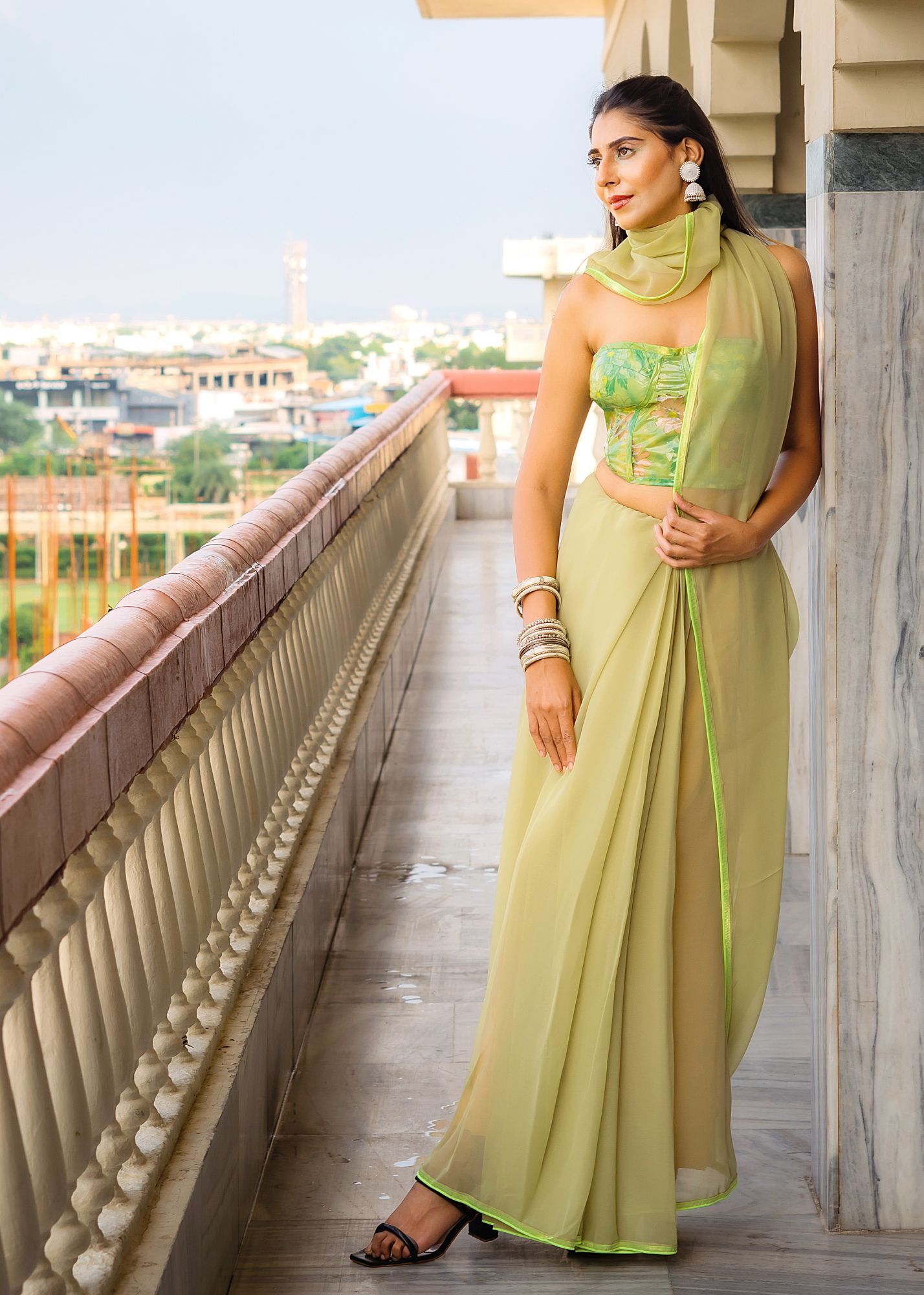 Pastel green saree with corset blouse