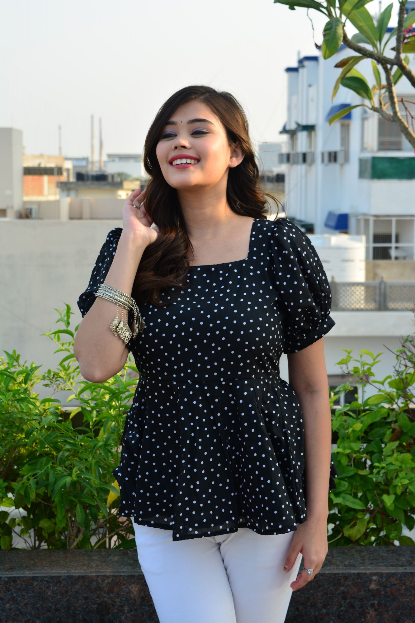 Black polka dot top