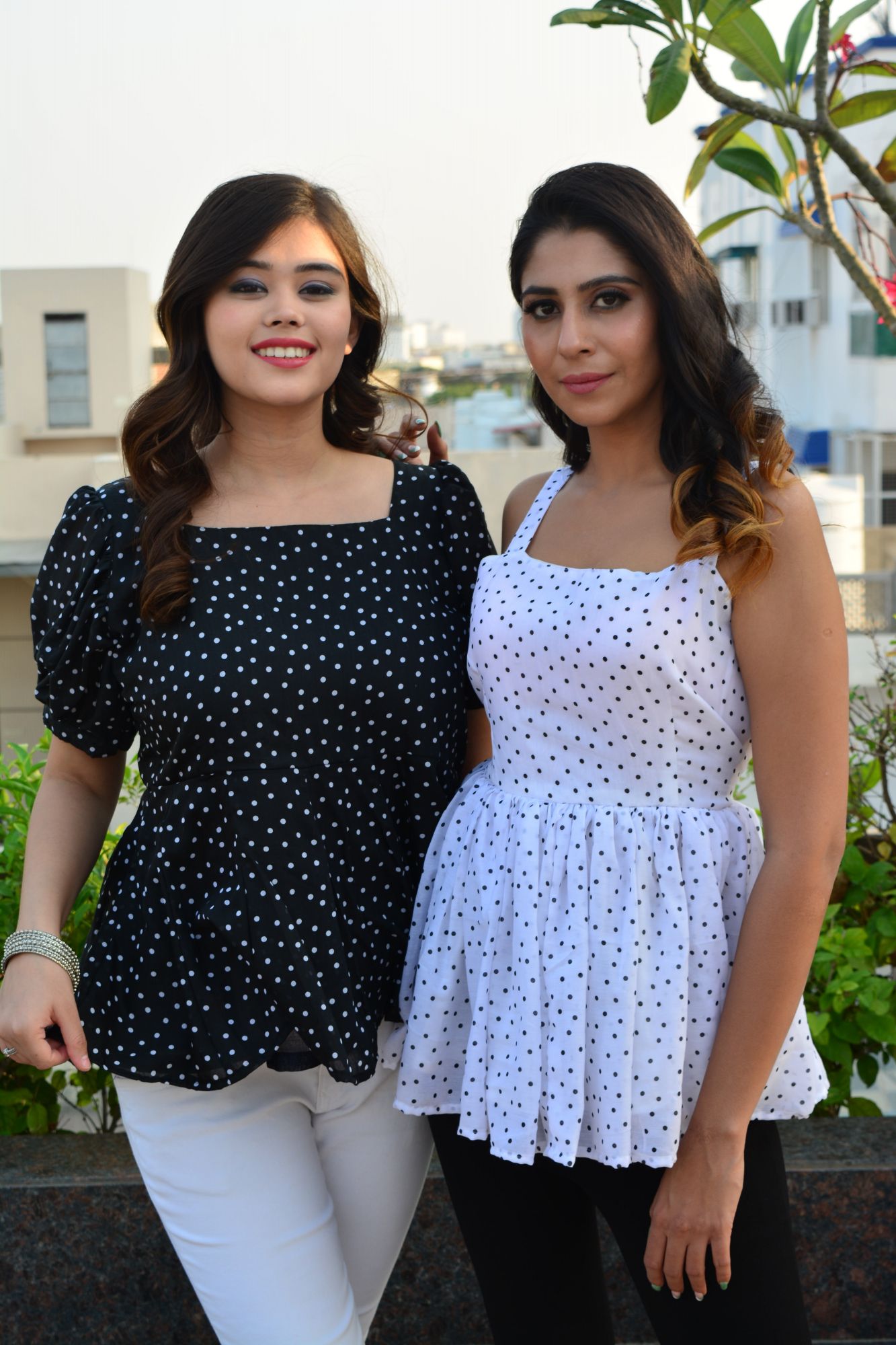 White polka dot top