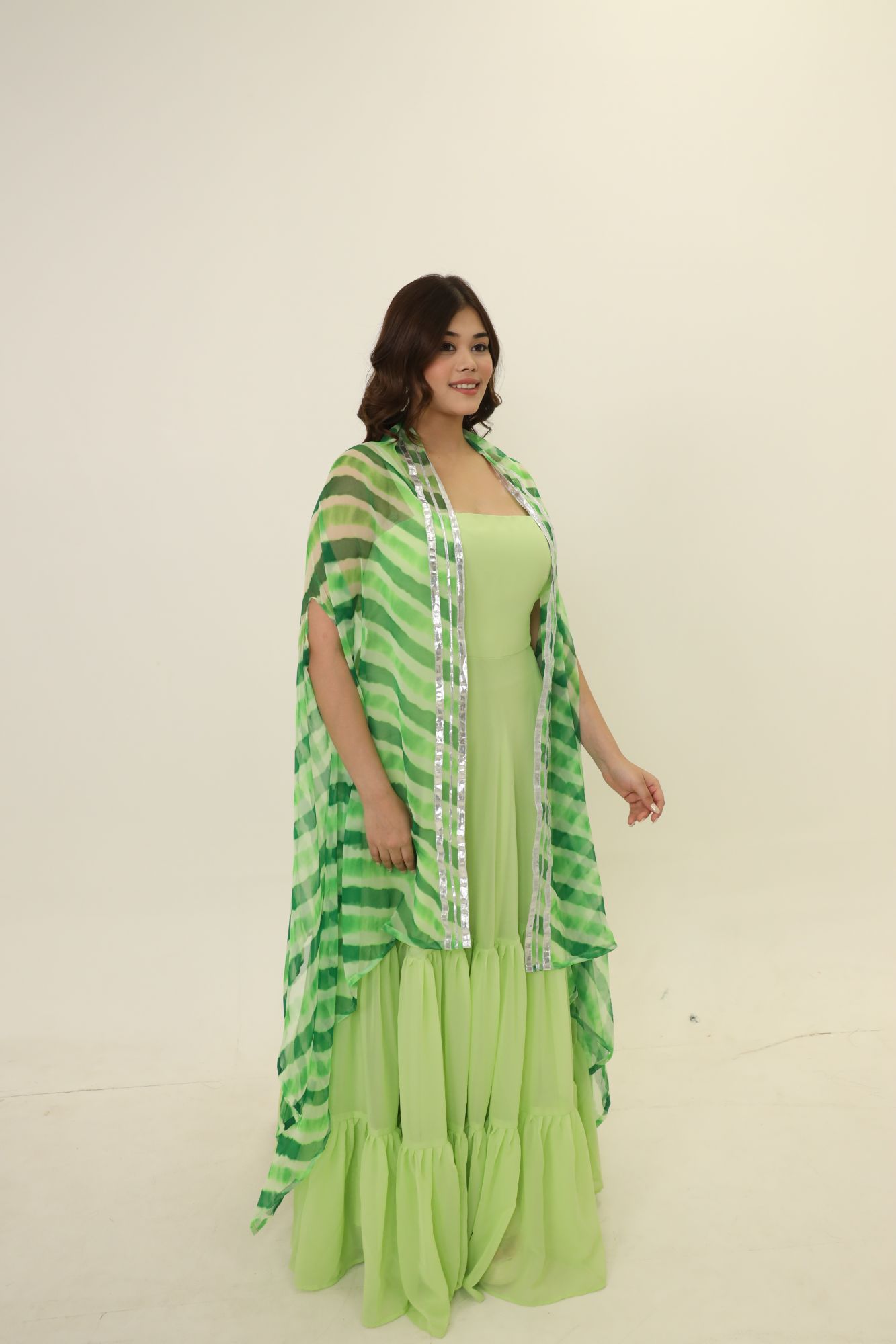 Pista Georgette Dress With Green Lehariya Cape