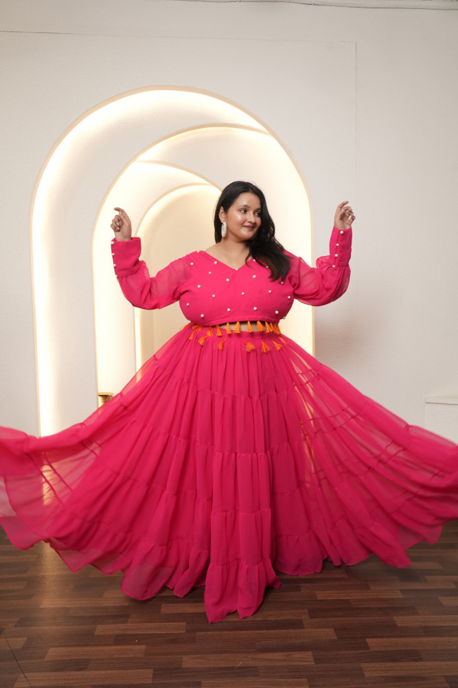 Image of Rani And Orange Magic Tassels Details Georgette Lehenga Set