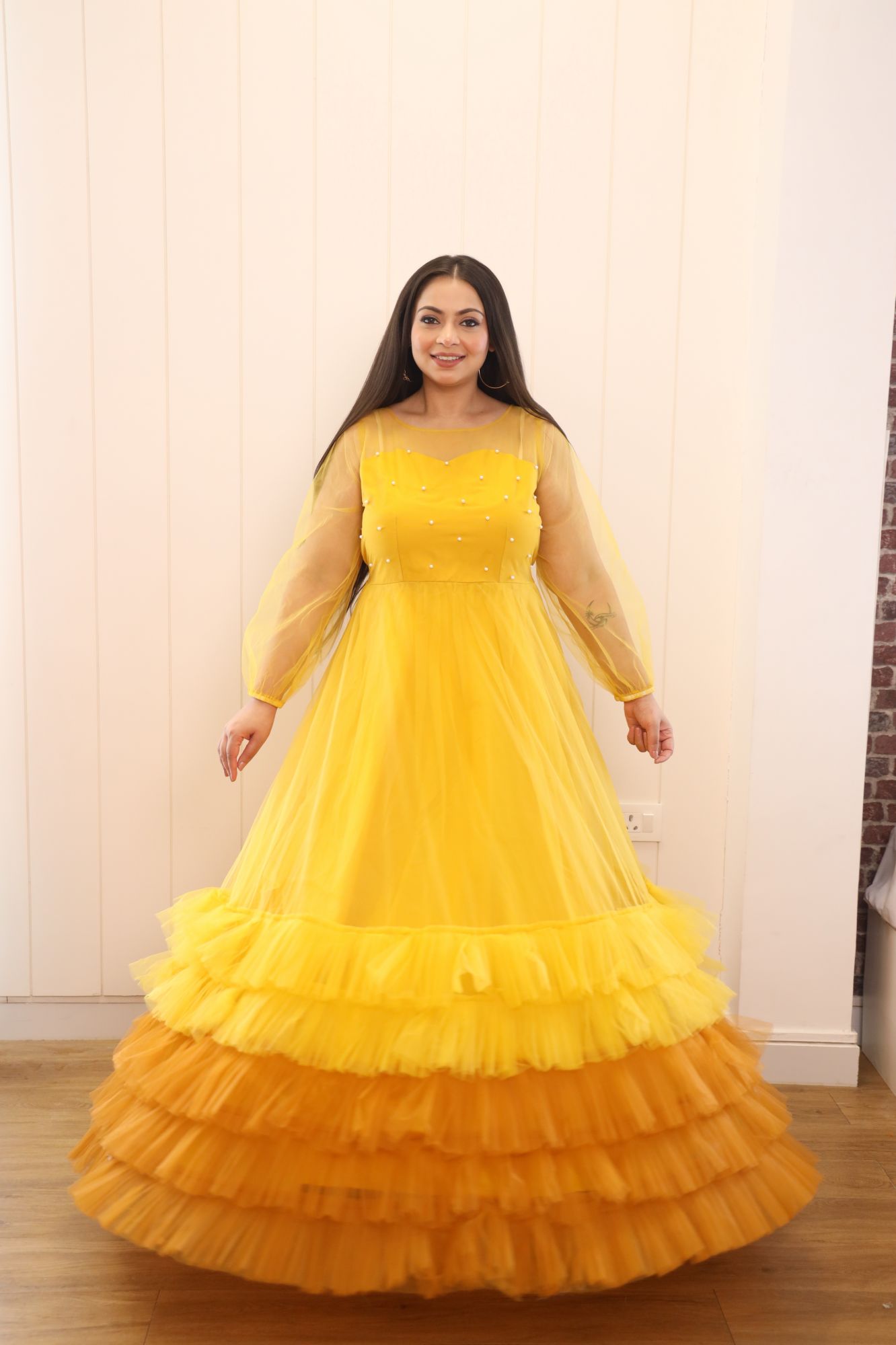 Yellow Shaded Pearl Net Frill Gown