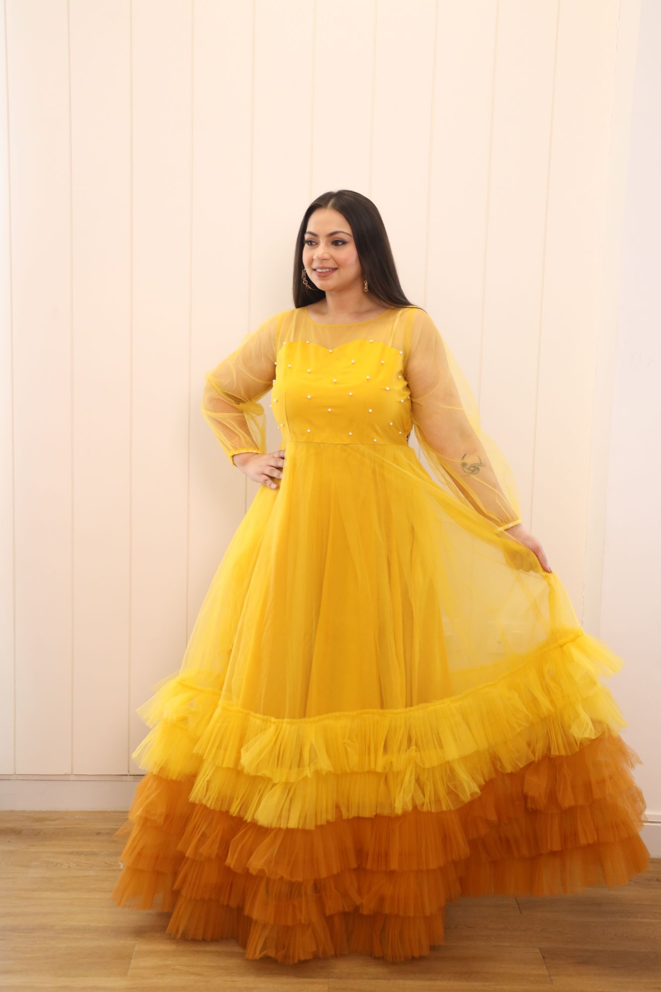 Yellow Shaded Pearl Net Frill Gown