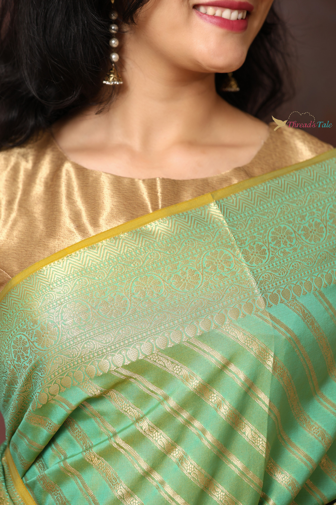 Pastel Green Saree With Woven Golden Stripes