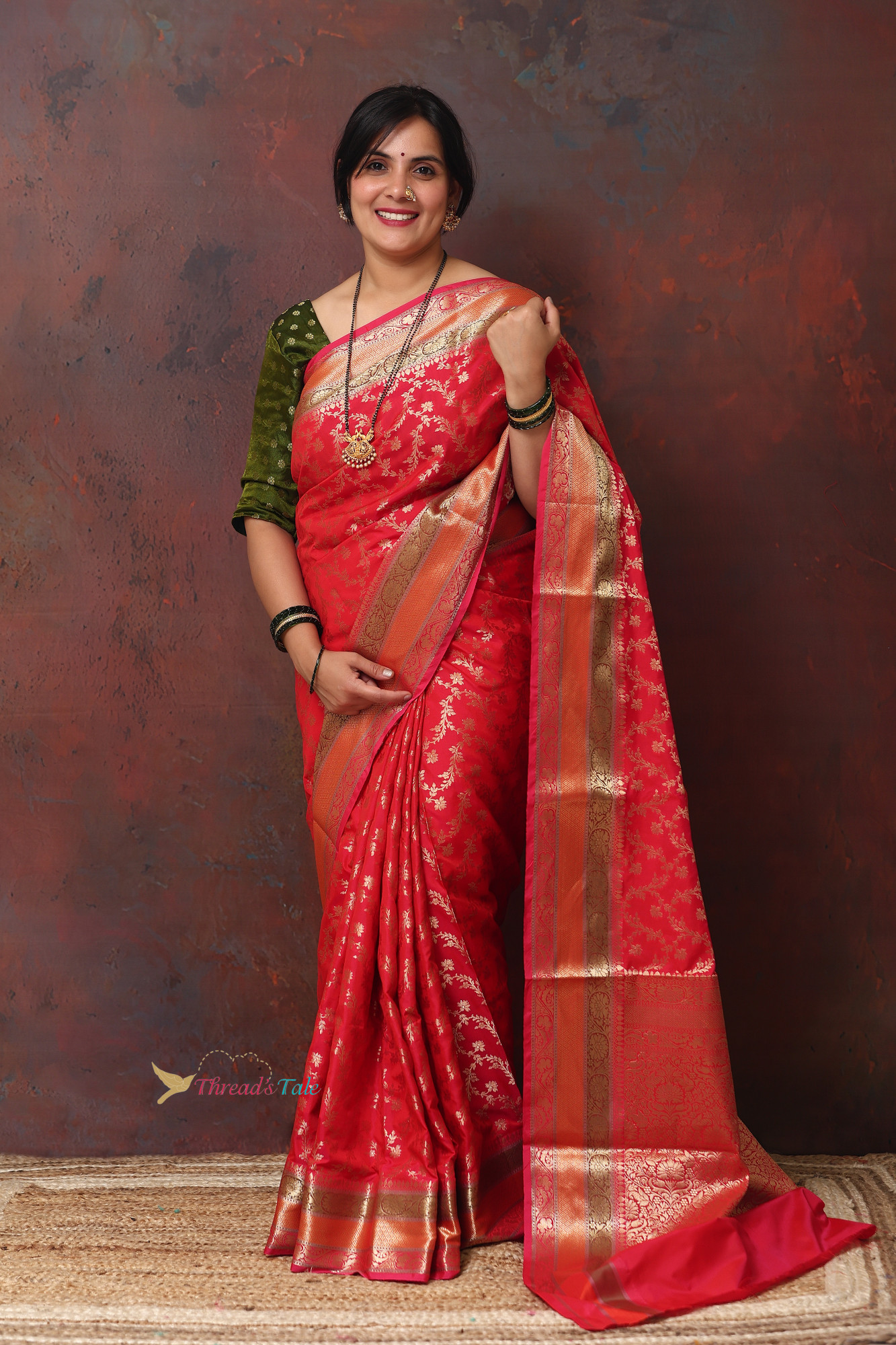 Red Zari Brocaded Saree With Three Red Colored Border