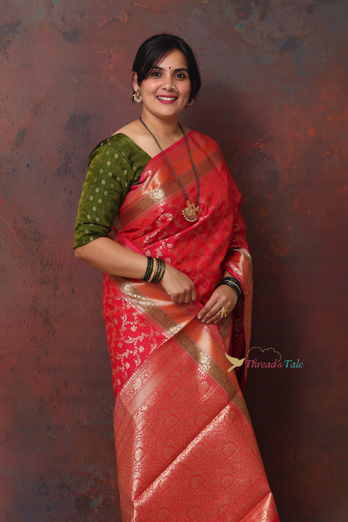 Red Zari Brocaded Saree With Three Red Colored Border