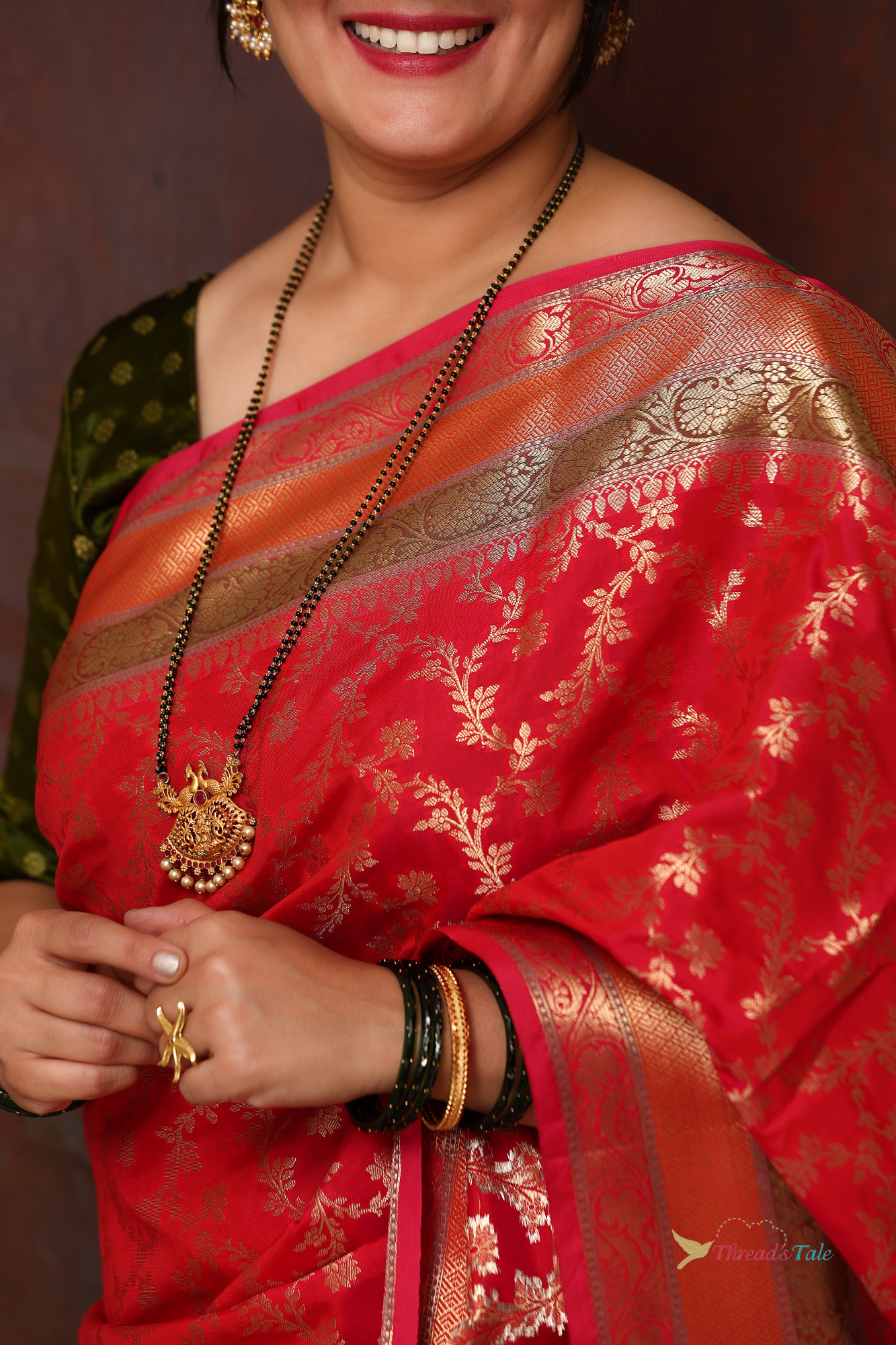 Red Zari Brocaded Saree With Three Red Colored Border