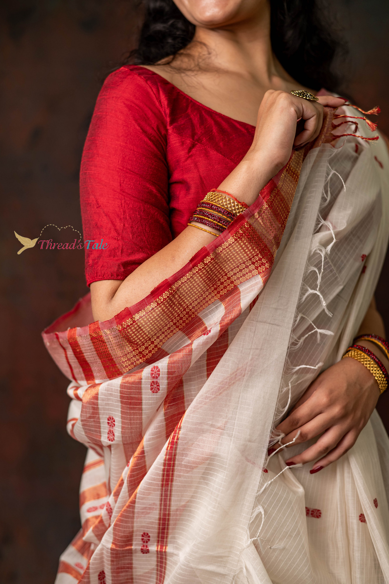 Milky White Handwoven Maheshwari Silk Saree With Red Textured Border