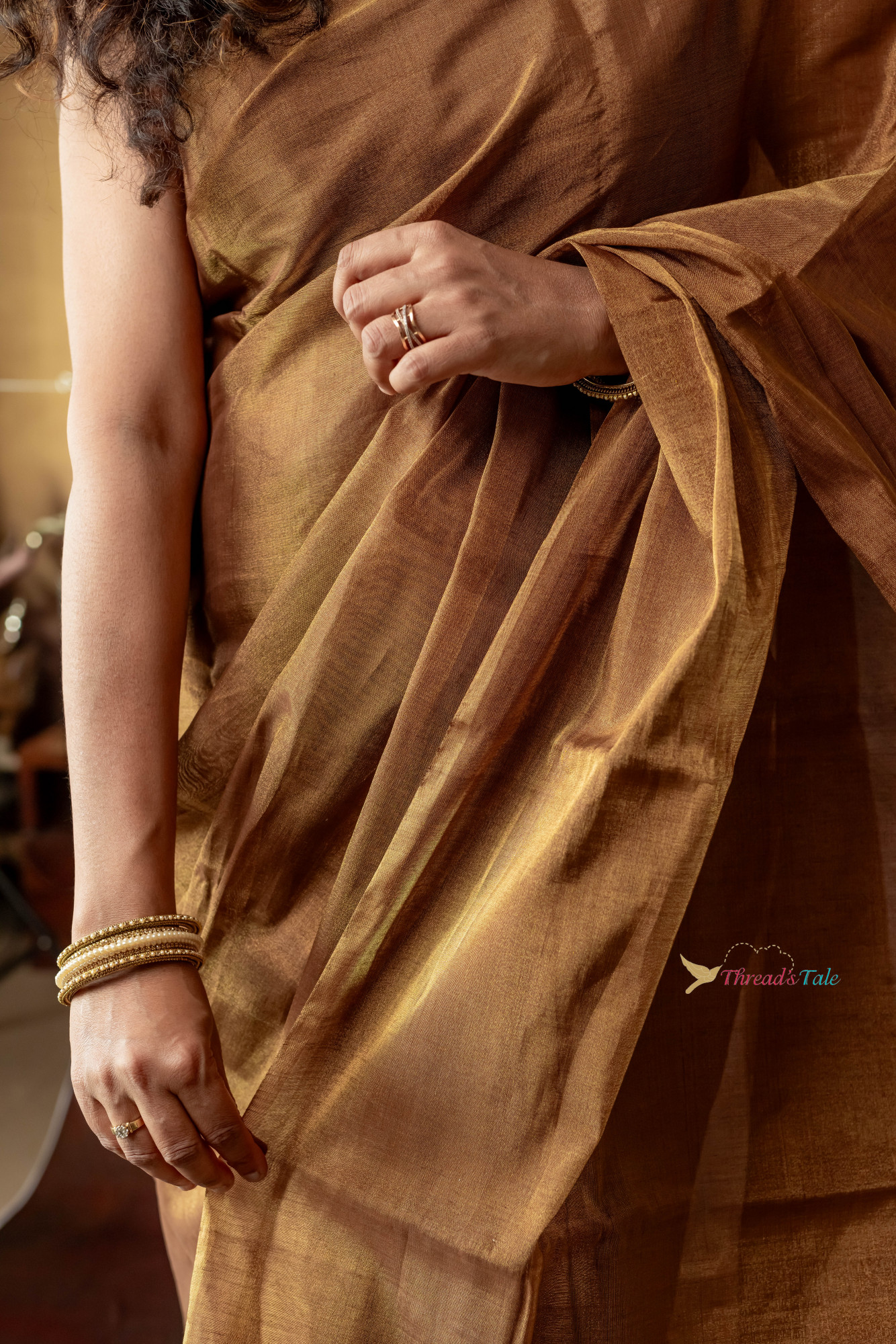Brown Metallic Handwoven Tissue Saree