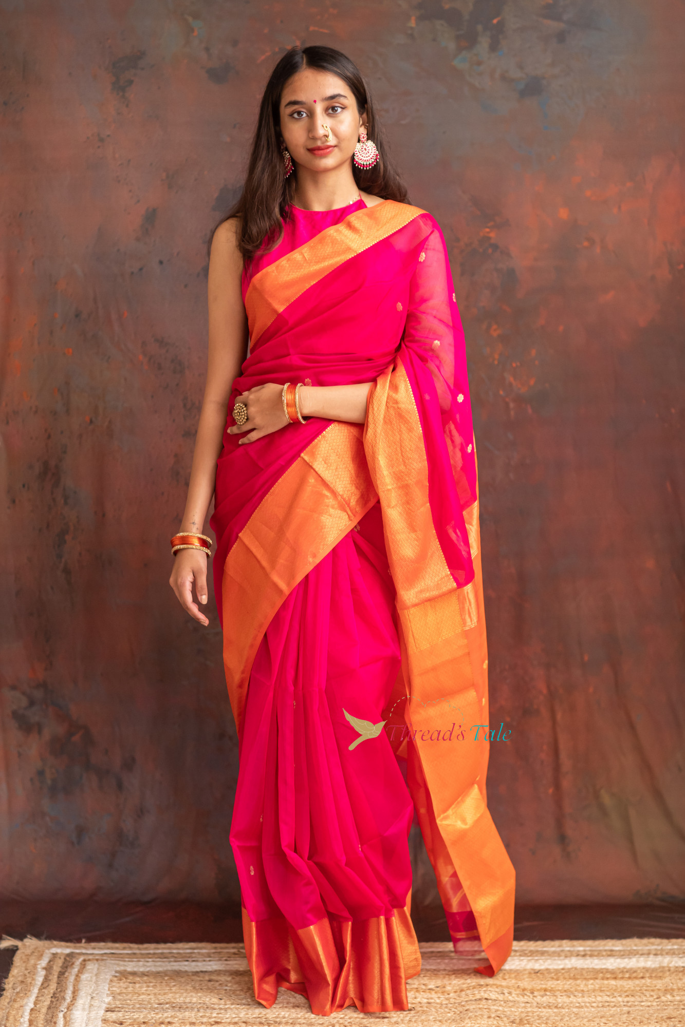 Festive Pink Handwoven Saree With Contras Golden Border And Golden Buttis