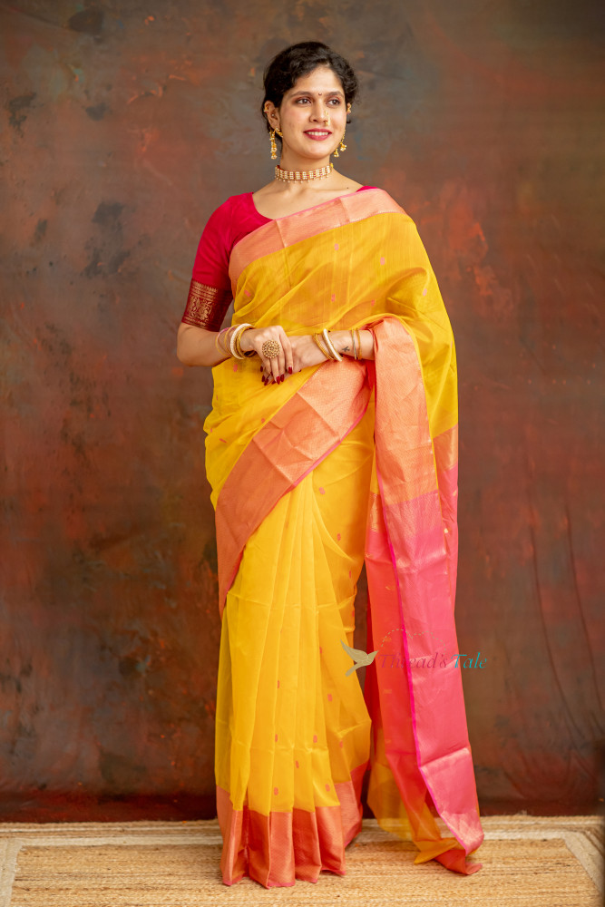 Image of Yellow Handwoven Tissue Butti Saree With Contrast Border