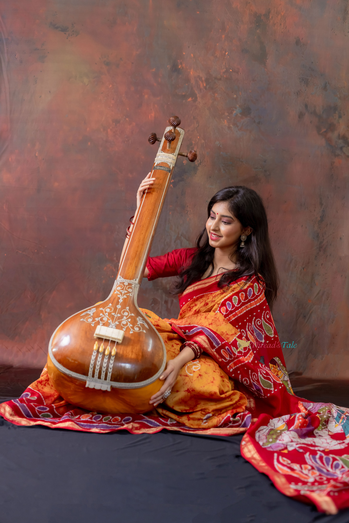 Orange Hand Batik Painted Handwoven Saree