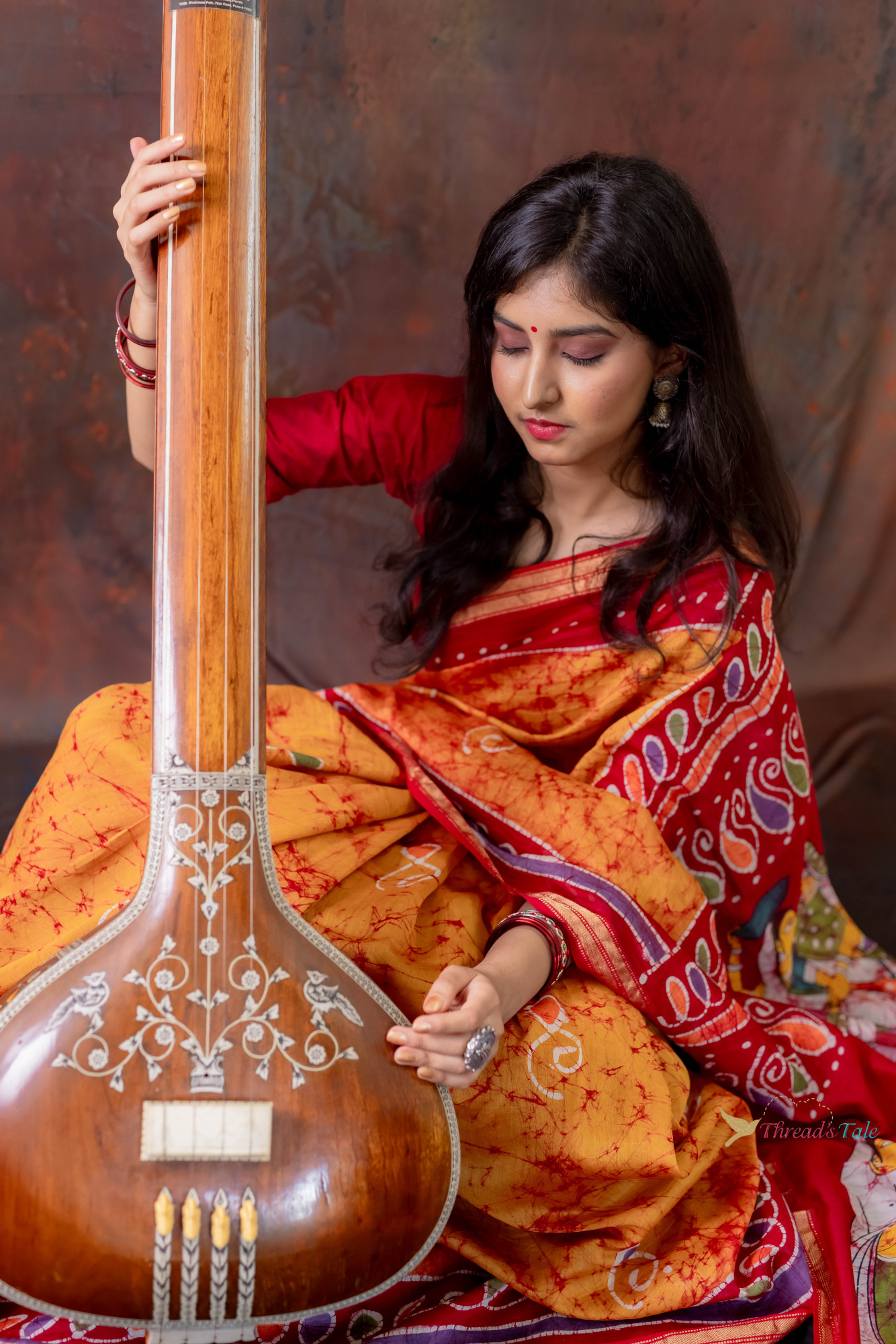 Orange Hand Batik Painted Handwoven Saree