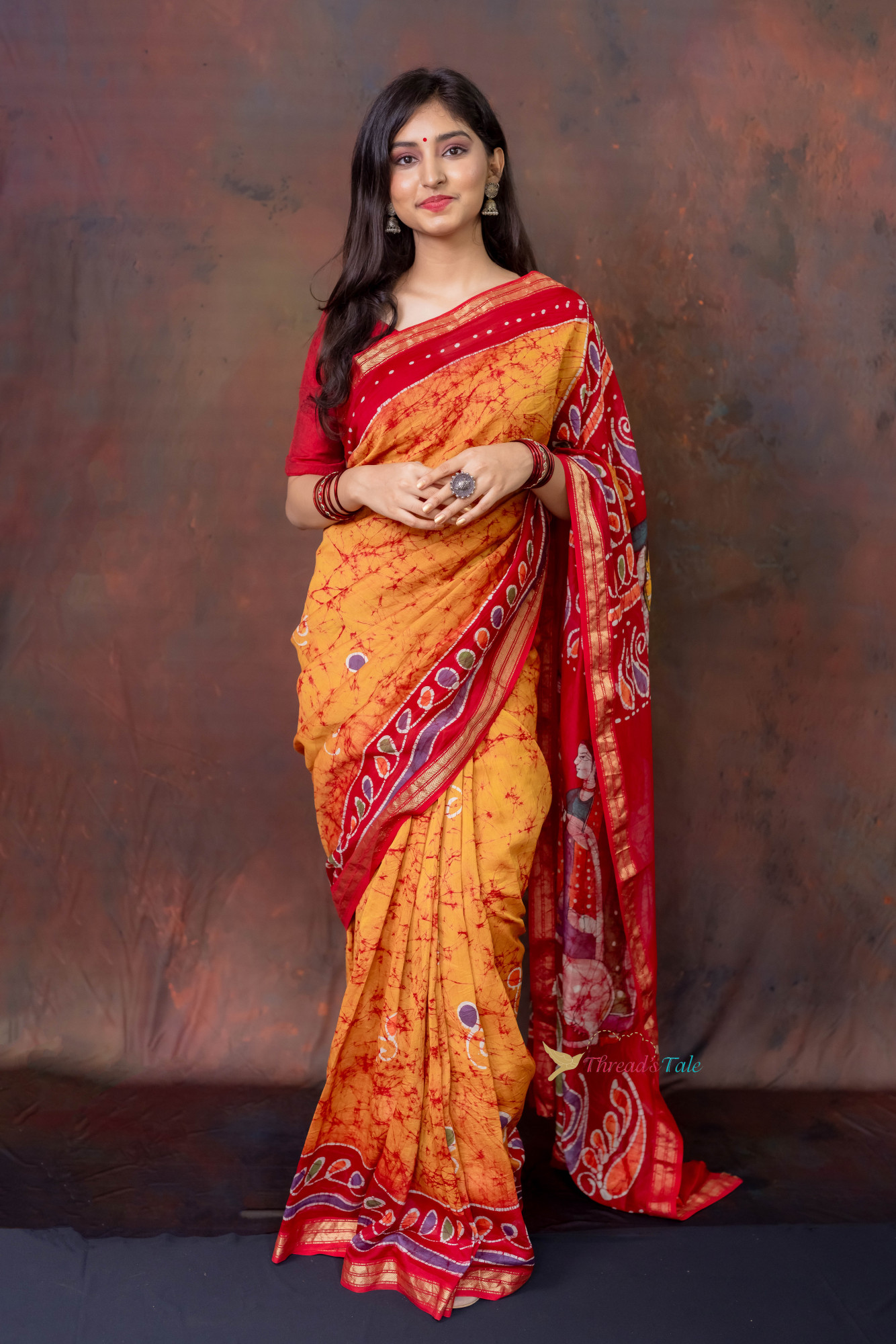 Orange Hand Batik Painted Handwoven Saree