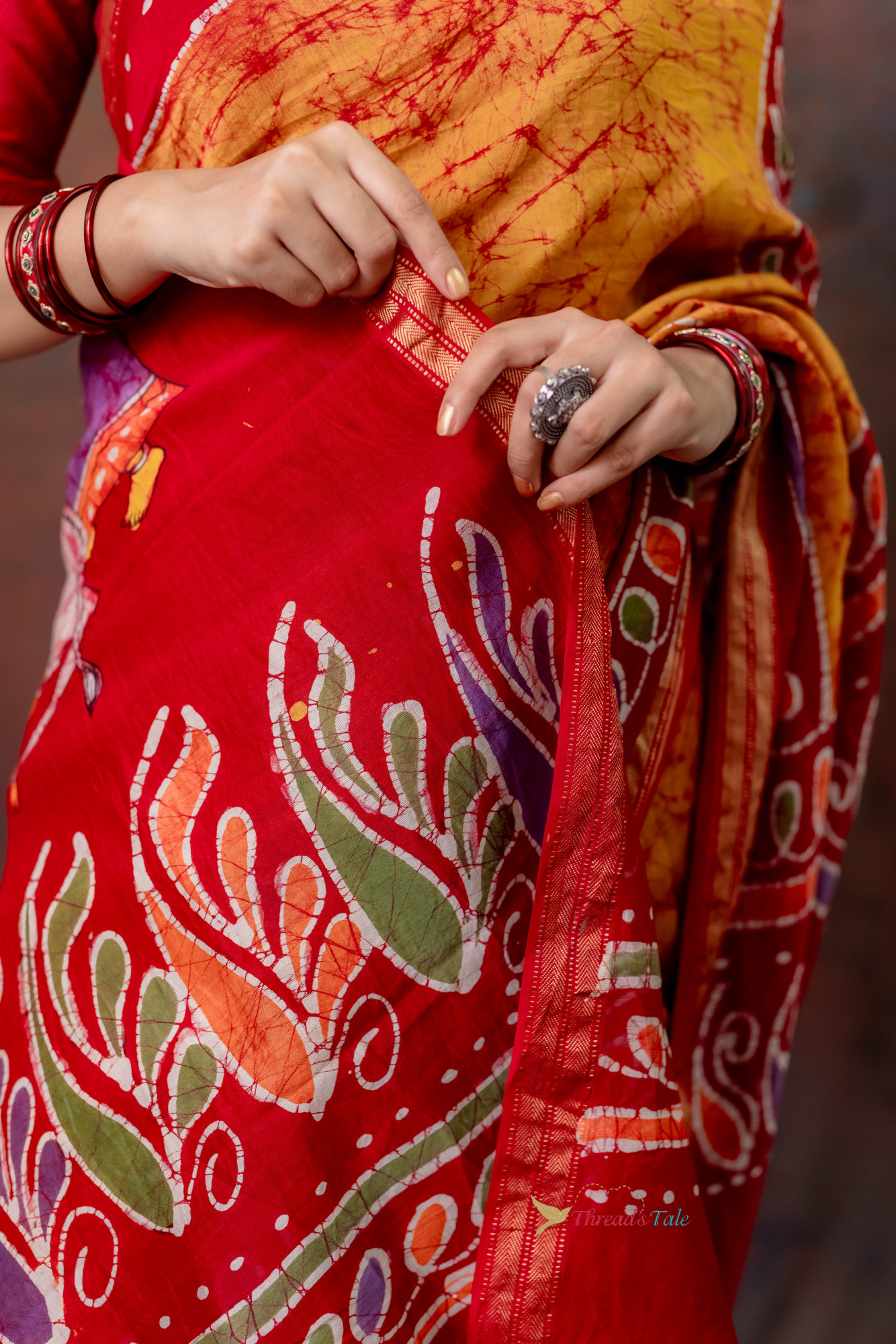 Orange Hand Batik Painted Handwoven Saree