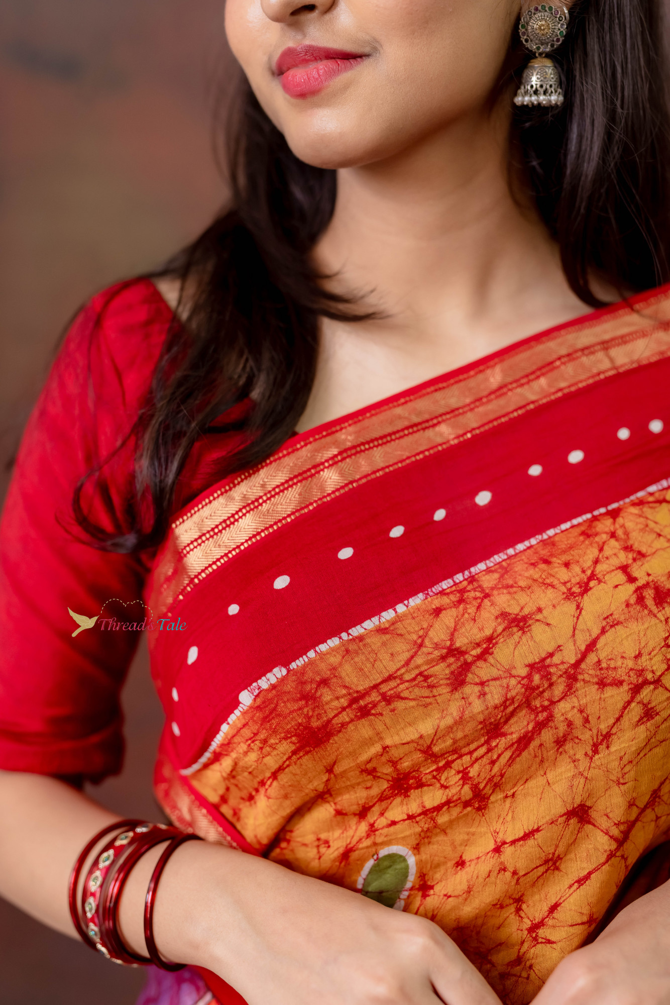 Orange Hand Batik Painted Handwoven Saree
