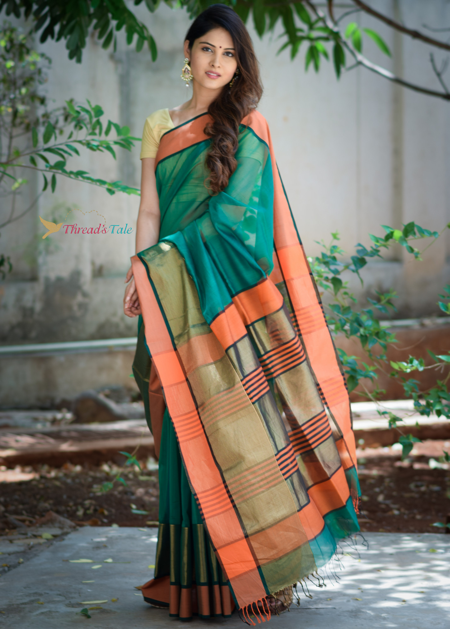 Green Handwoven Maheshwari Silk Saree with orange border