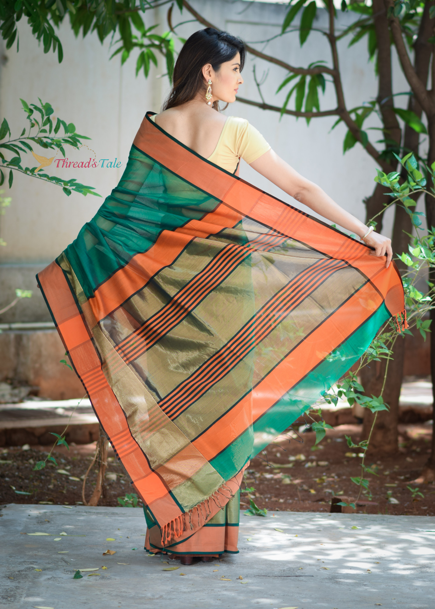 Green Handwoven Maheshwari Silk Saree with orange border