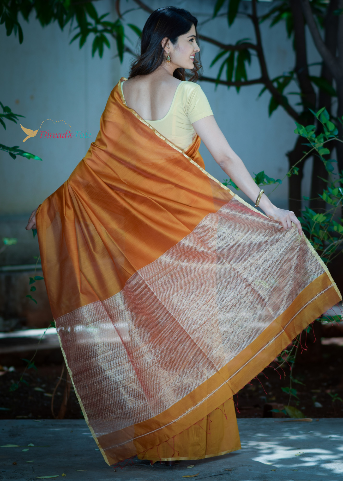 Saffron Orange Handwoven Maheshwari Silk Saree with Jute Tissue Aanchal