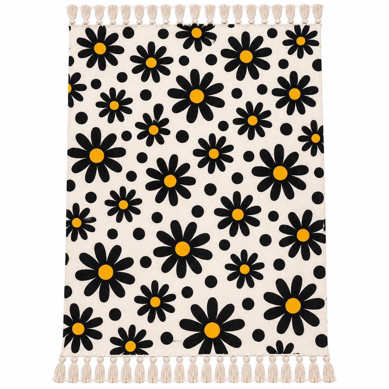 A cotton sofa throw with bold black retro daisy flower print