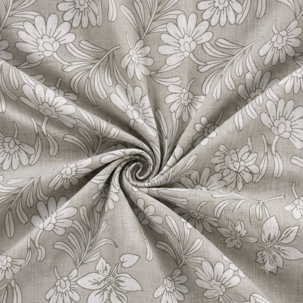Close-up swirl of grey hand block printed cotton dohar fabric with daisy floral pattern