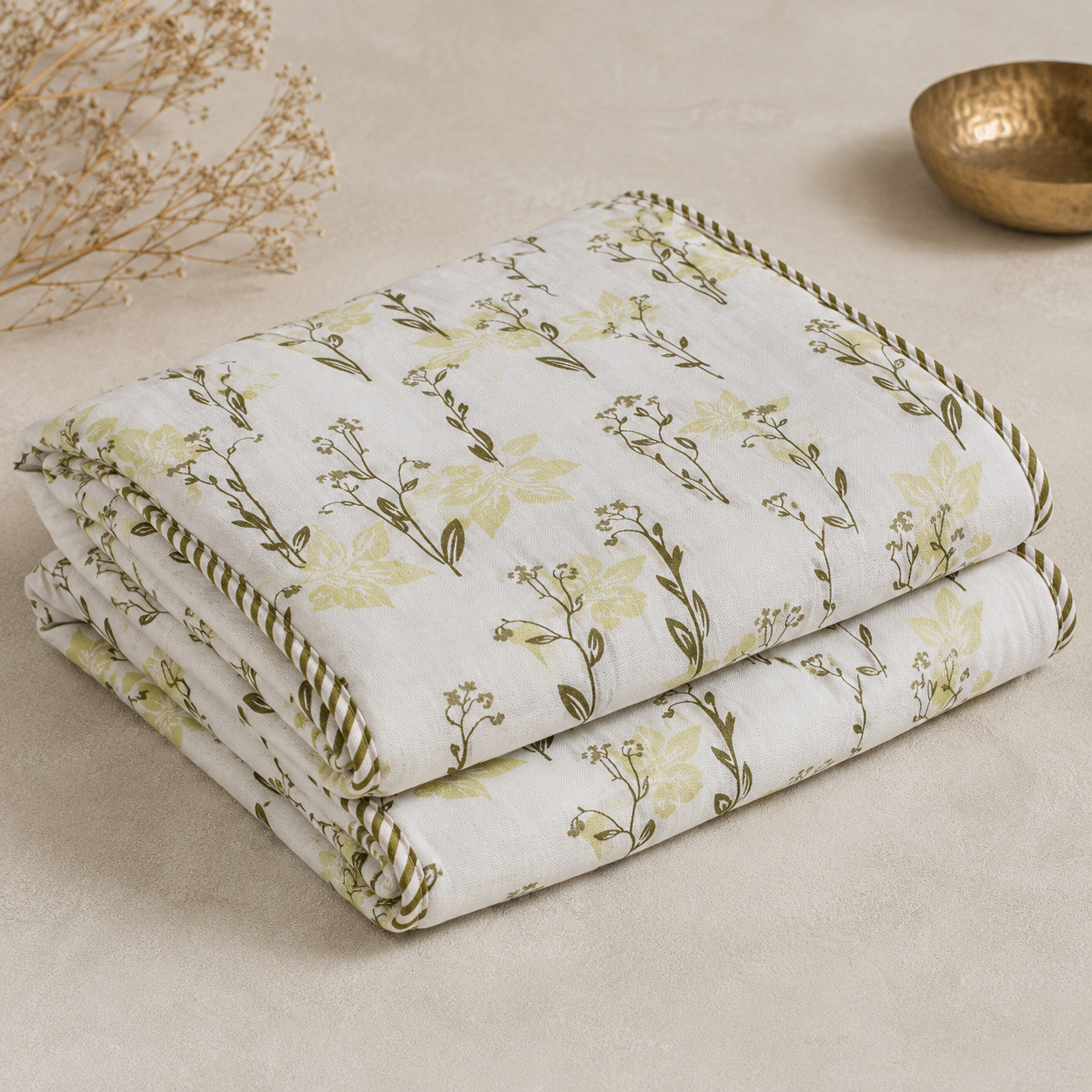 Folded set of 2 sage wildflower hand block printed cotton dohars showing striped cord border detail
