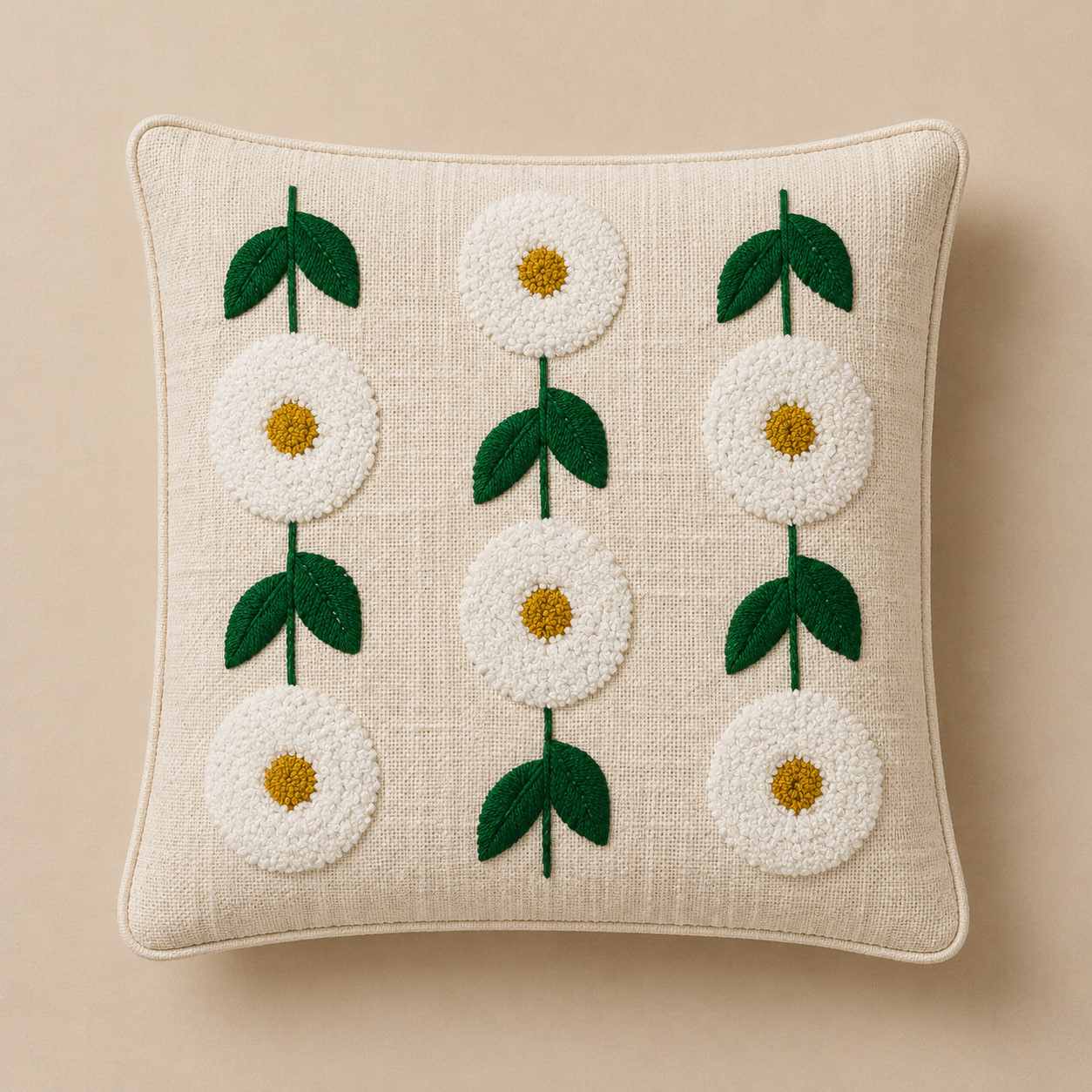 Flat lay of white daisy embroidered cushion cover three column design