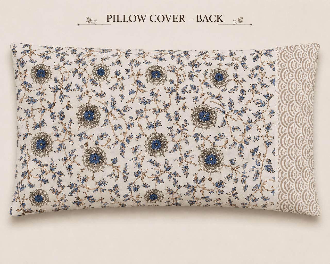 Pillow cover back showing all-over mini floral scatter print with scalloped edge trim
