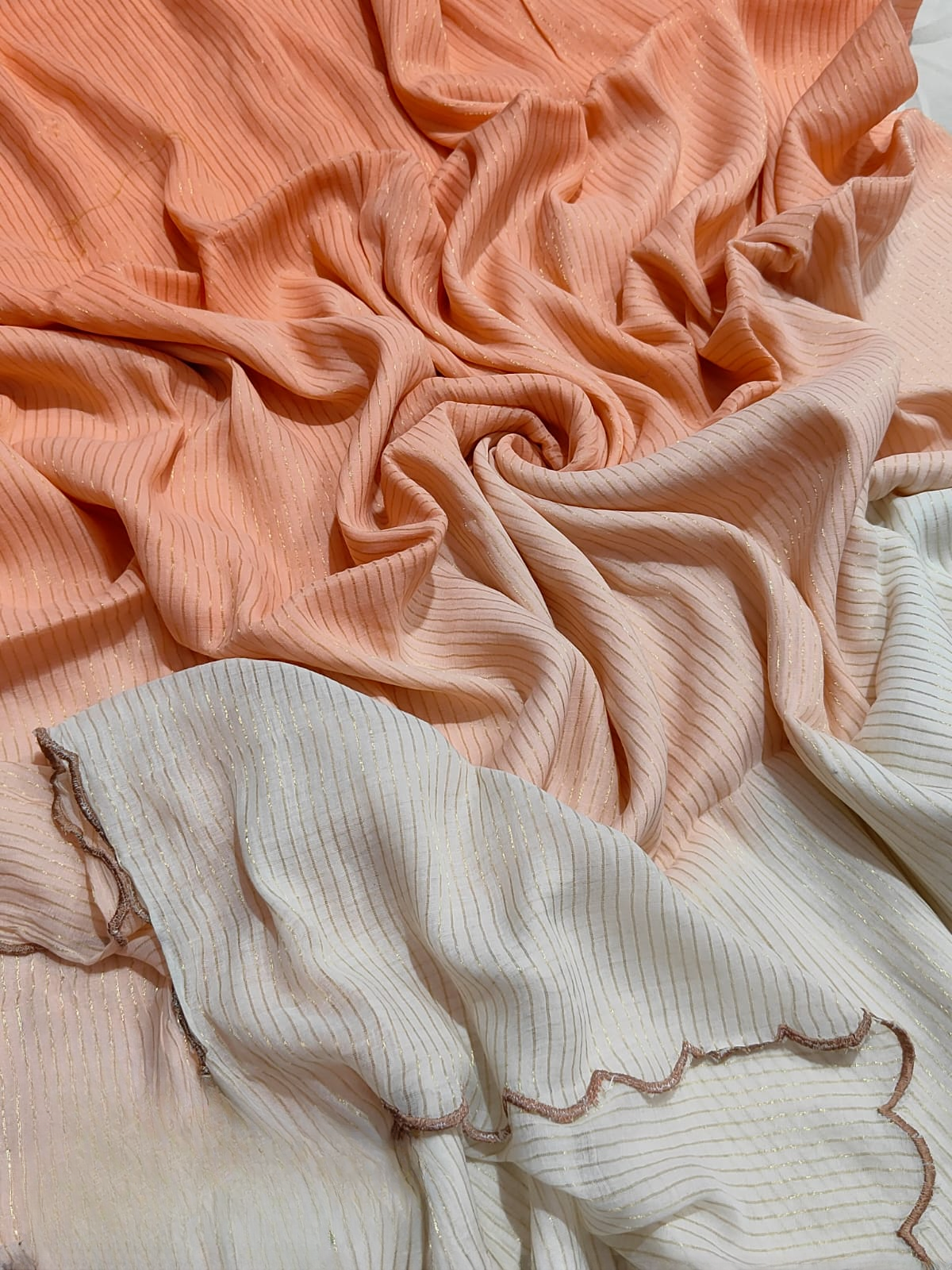 Mul cotton saree with zari stripes and scalloped edges