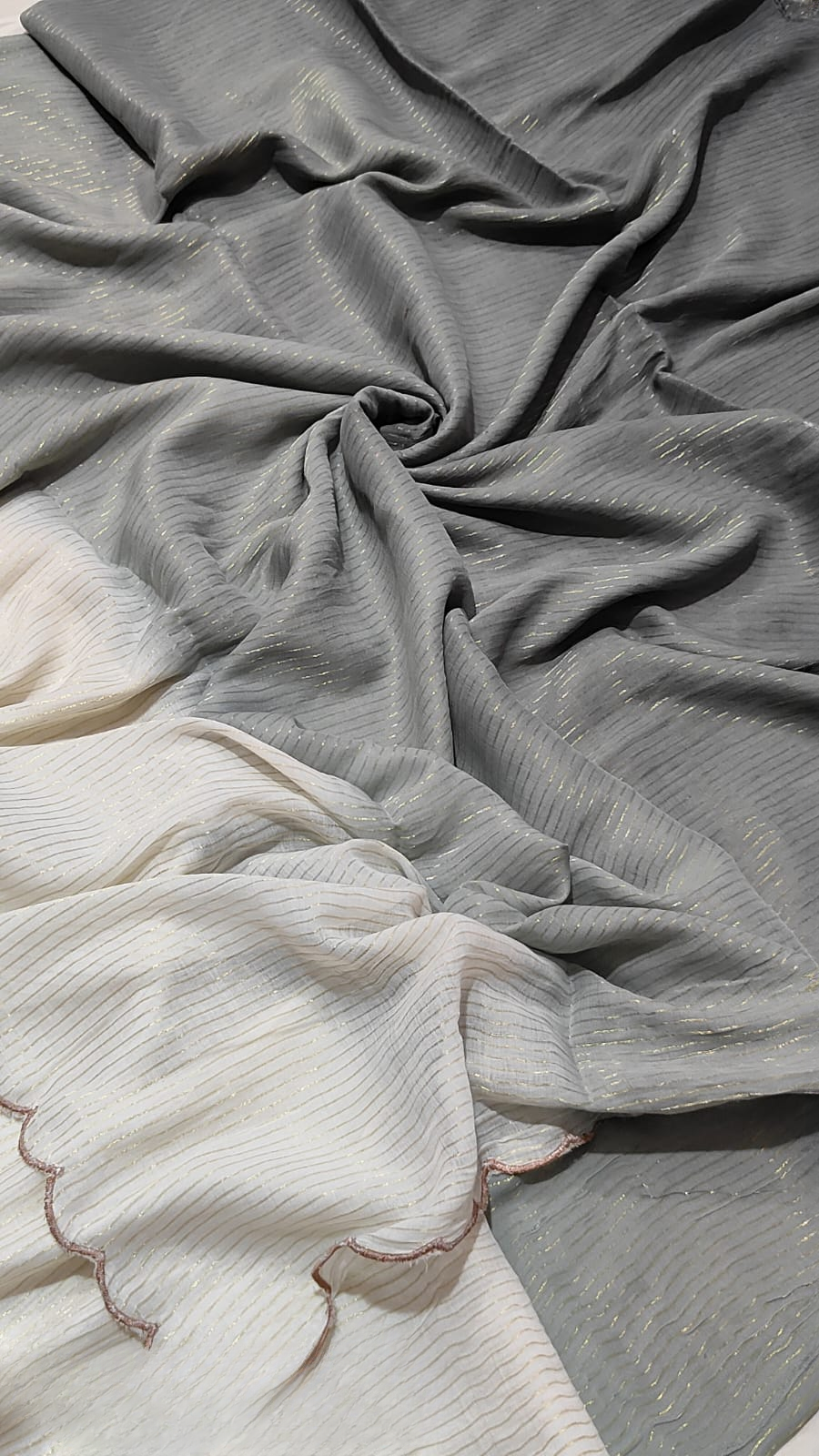 Mul cotton saree with zari stripes and scalloped edges